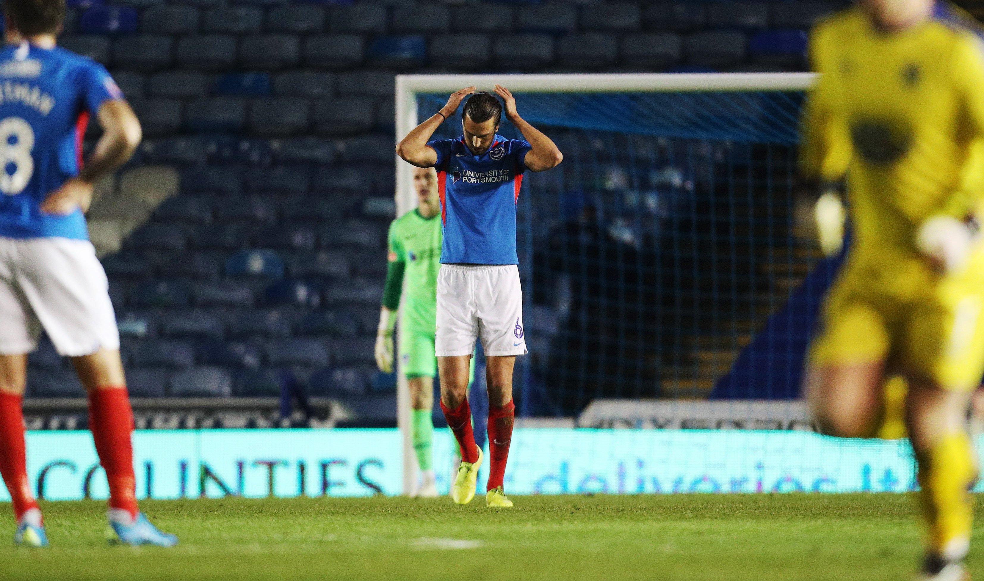 Pompey defender Christian Burgess will serve a one-match ban