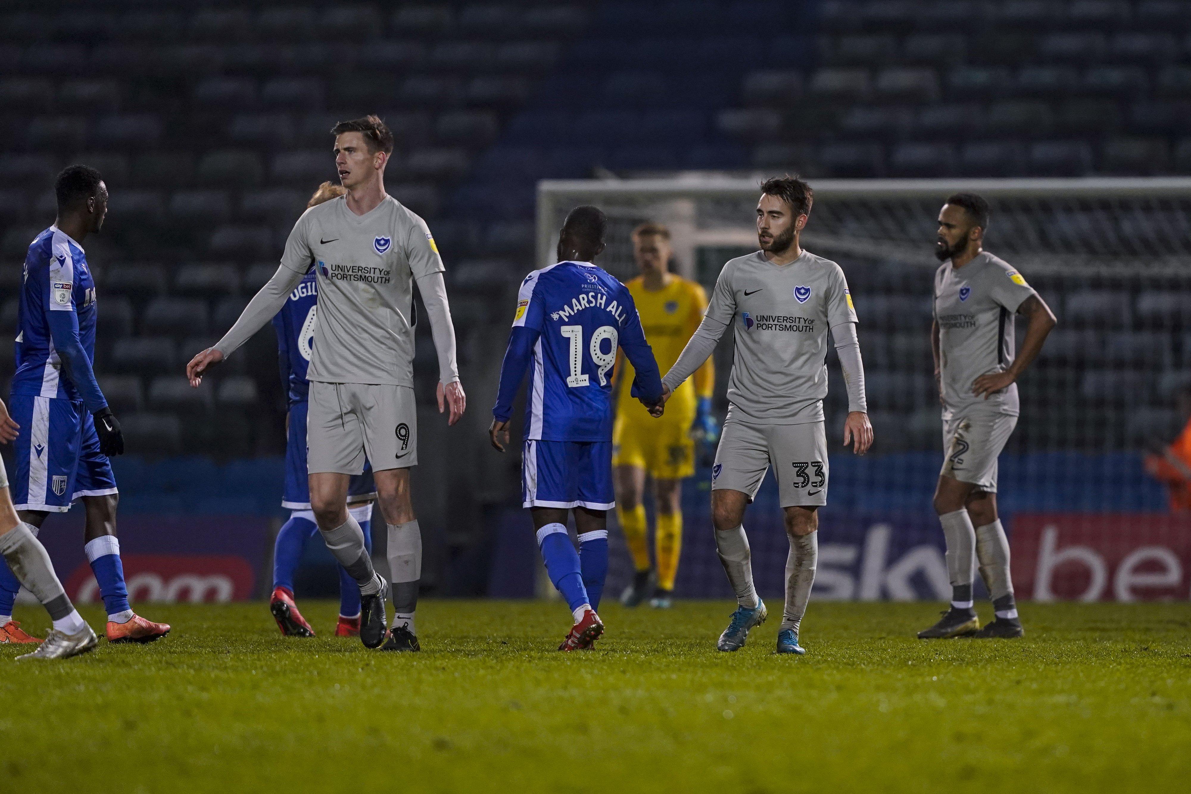 Ben Close and Oli Hawkins shake hands with the opposition at the final whistle  Picture: Jason Brown