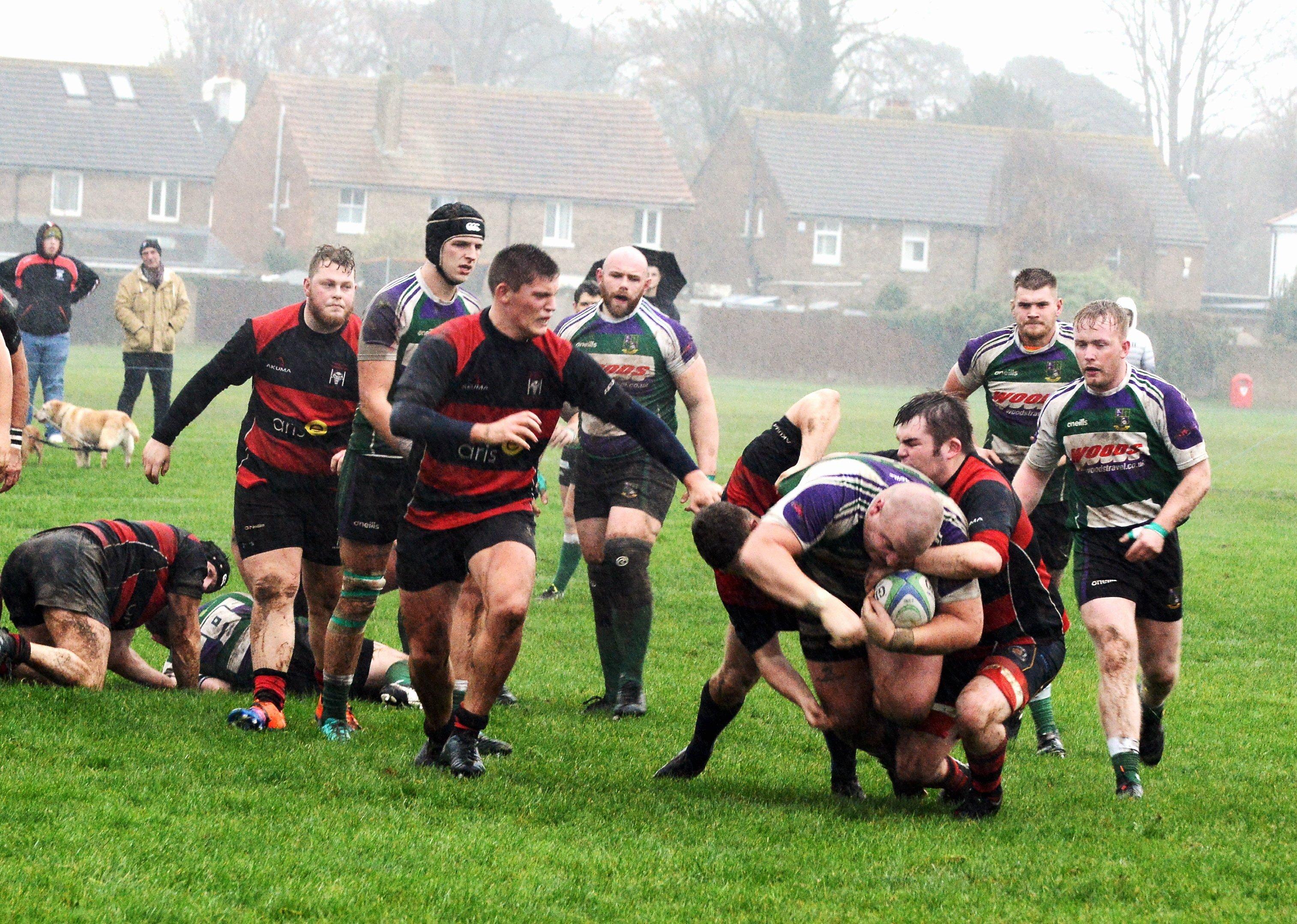 Fareham (red) in action during their win at Bognor.  Picture by Kate Shemilt