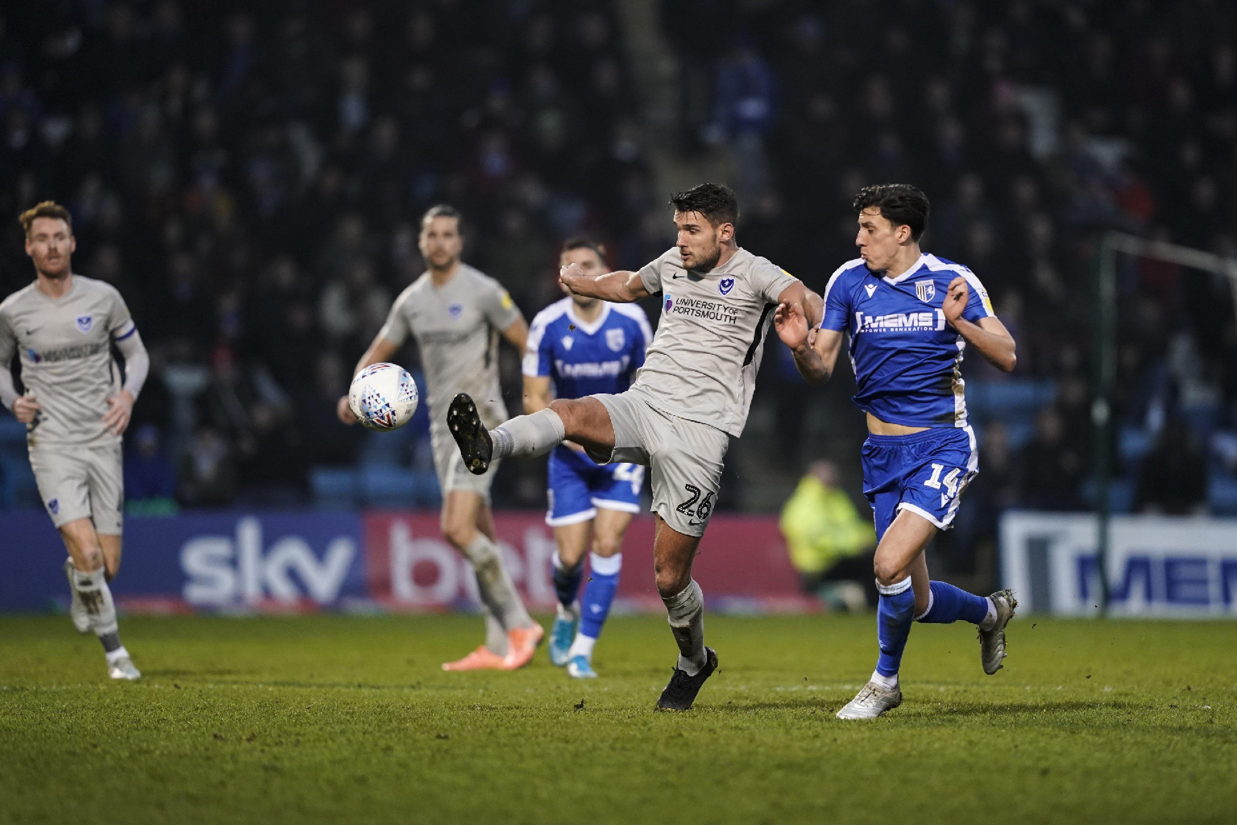 Gareth Evans battles for the ball during Pompey's draw with Gillingham. Picture: Jason Brown