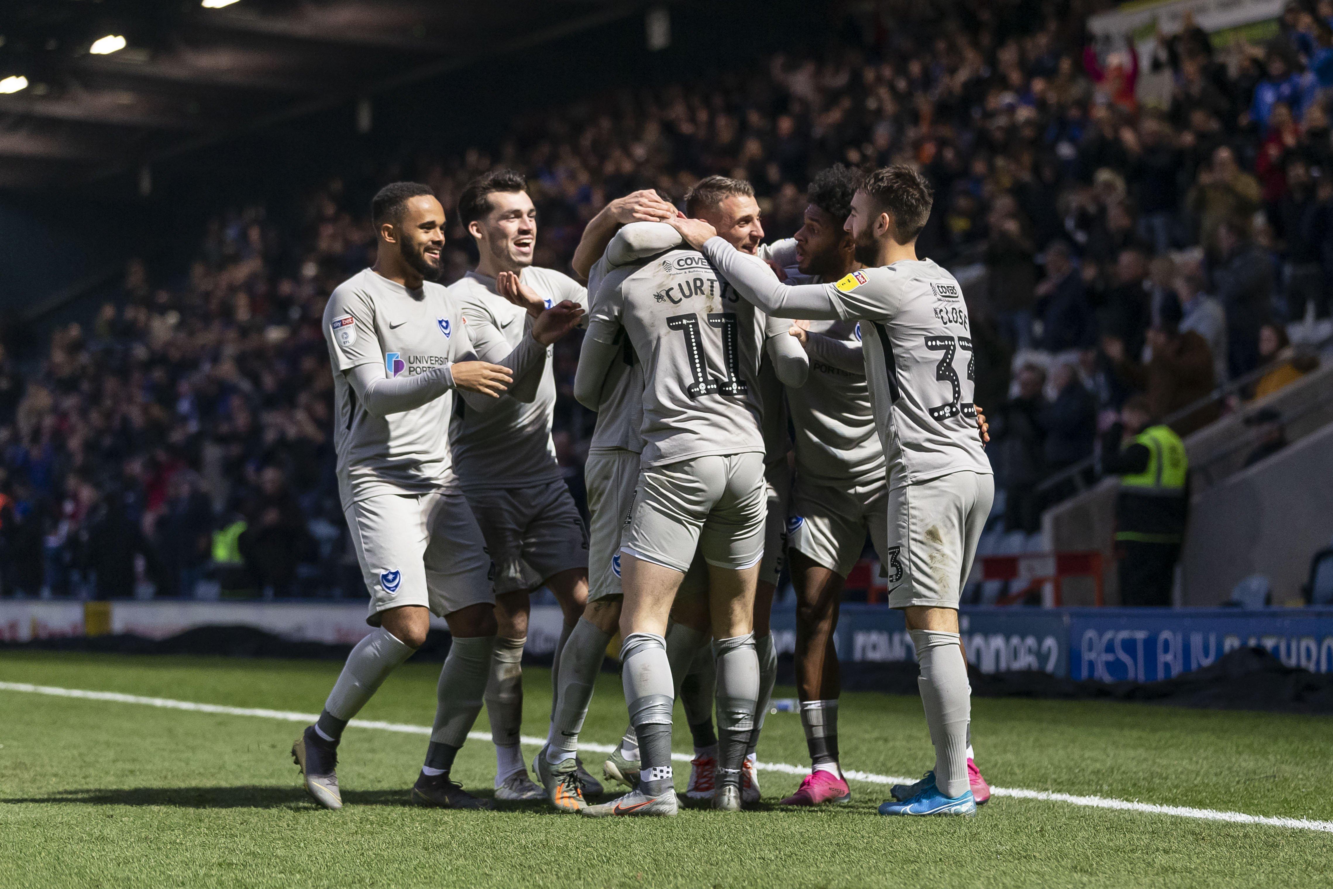 Ronan Curtis of Portsmouth celebrates after scoring his side's second goal to make the score 0-2 during the Sky Bet League One match between Rochdale and Portsmouth at Spotland Stadium on November 23rd 2019 in Rochdale, England. (Photo by Daniel Chesterton/phcimages.com)