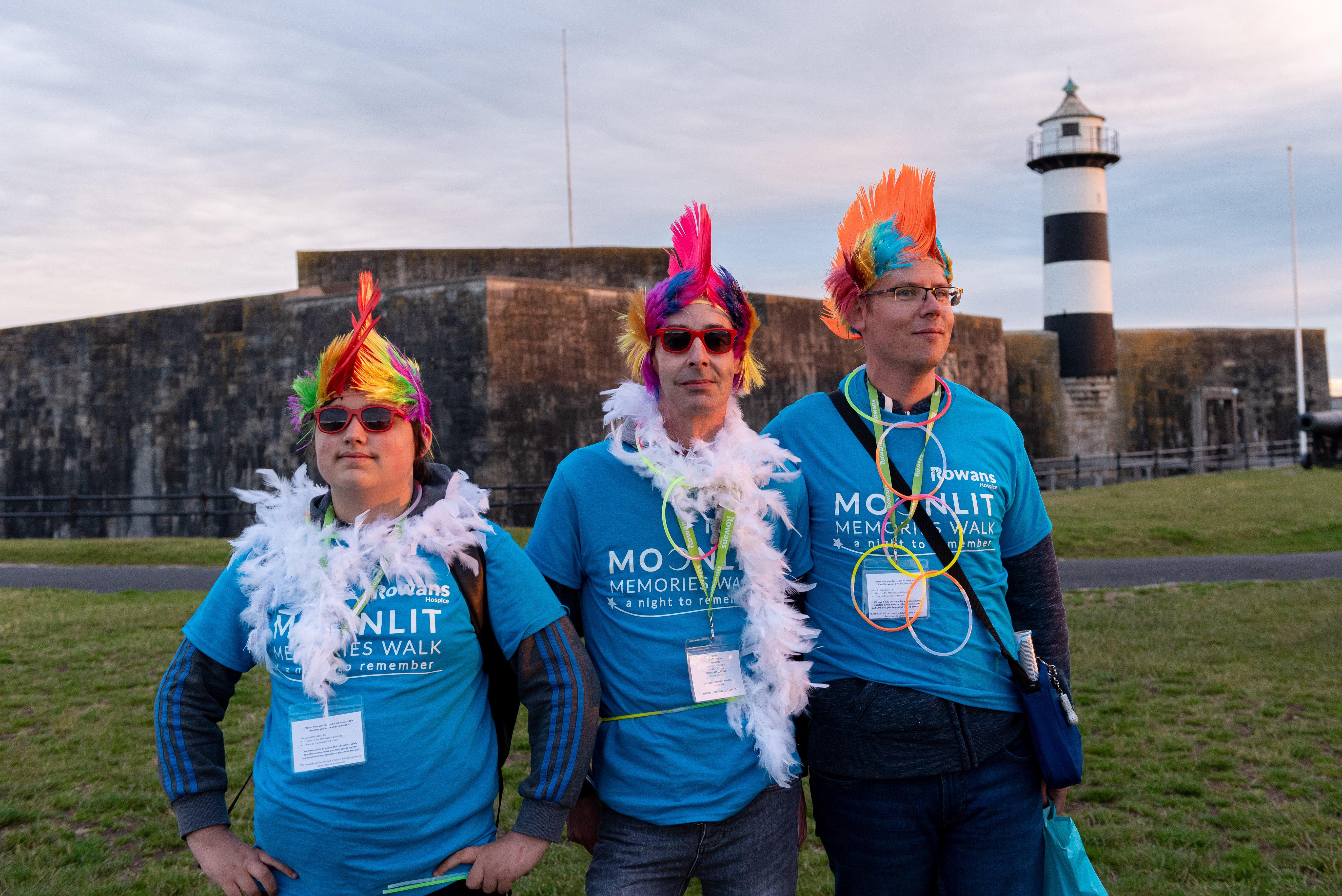 Moonlit Memories Walk 2019 for Rowans Hospice along the Seafront and Old Portsmouth - Pictured (l-r) Charlie Dean, Marc Maran and Mark Collins. Picture: Vernon Nash (150619-002)