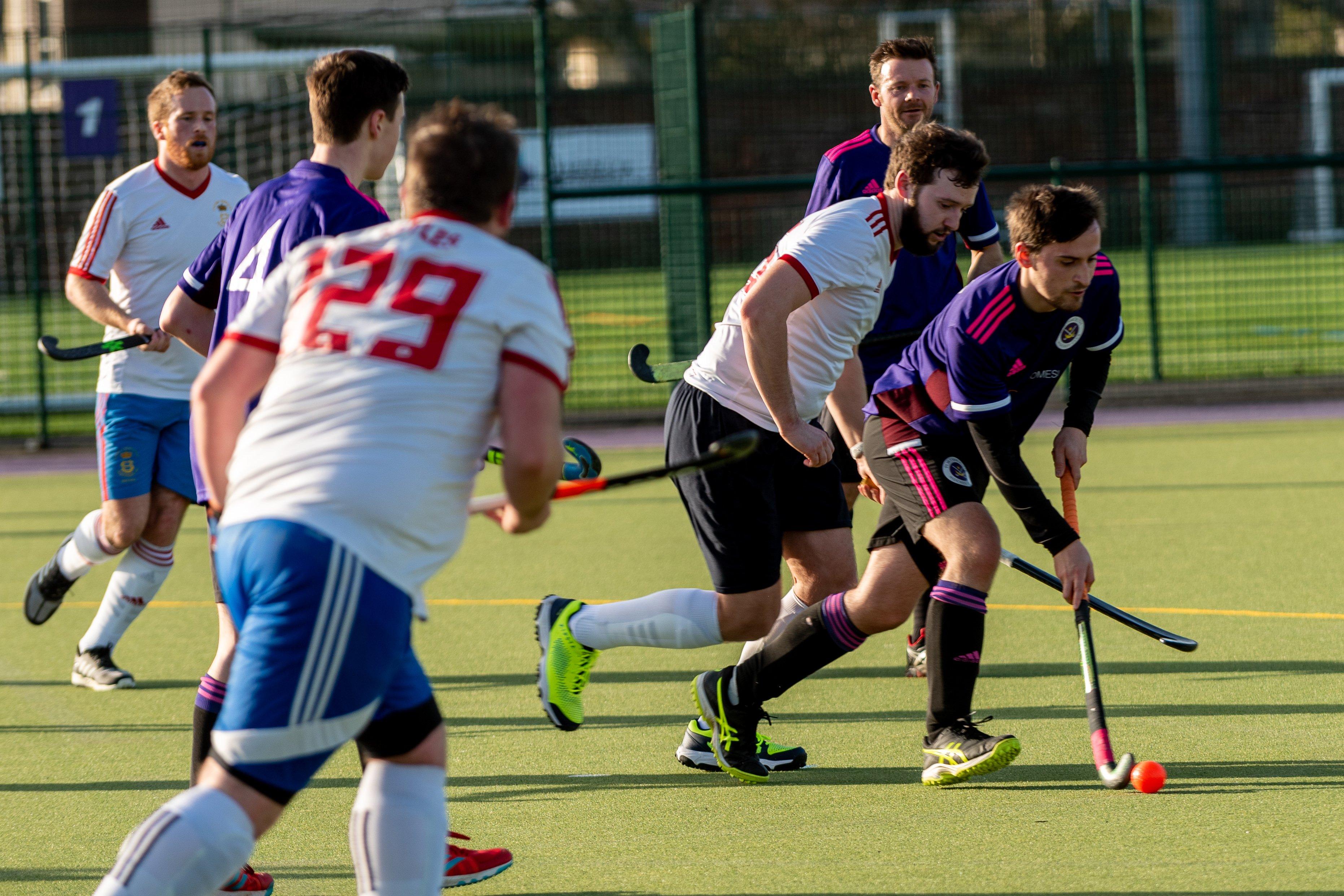 Portsmouth 2nds' Tom Love, right, in possession against US Portsmouth. Picture: Vernon Nash
