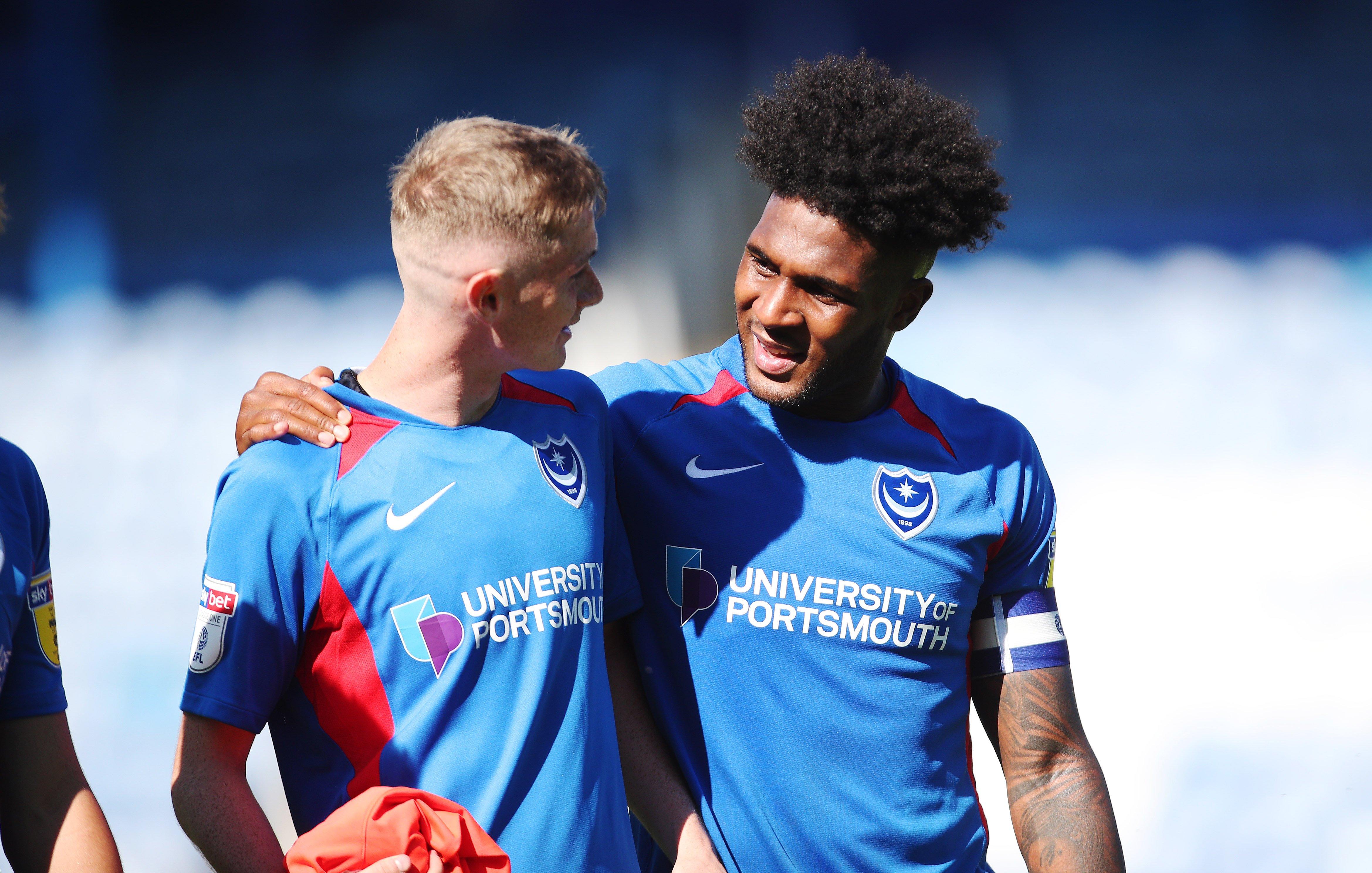 Eoin Teggart, left, Ellis Harrison at the final whistle Picture: Joe Pepler