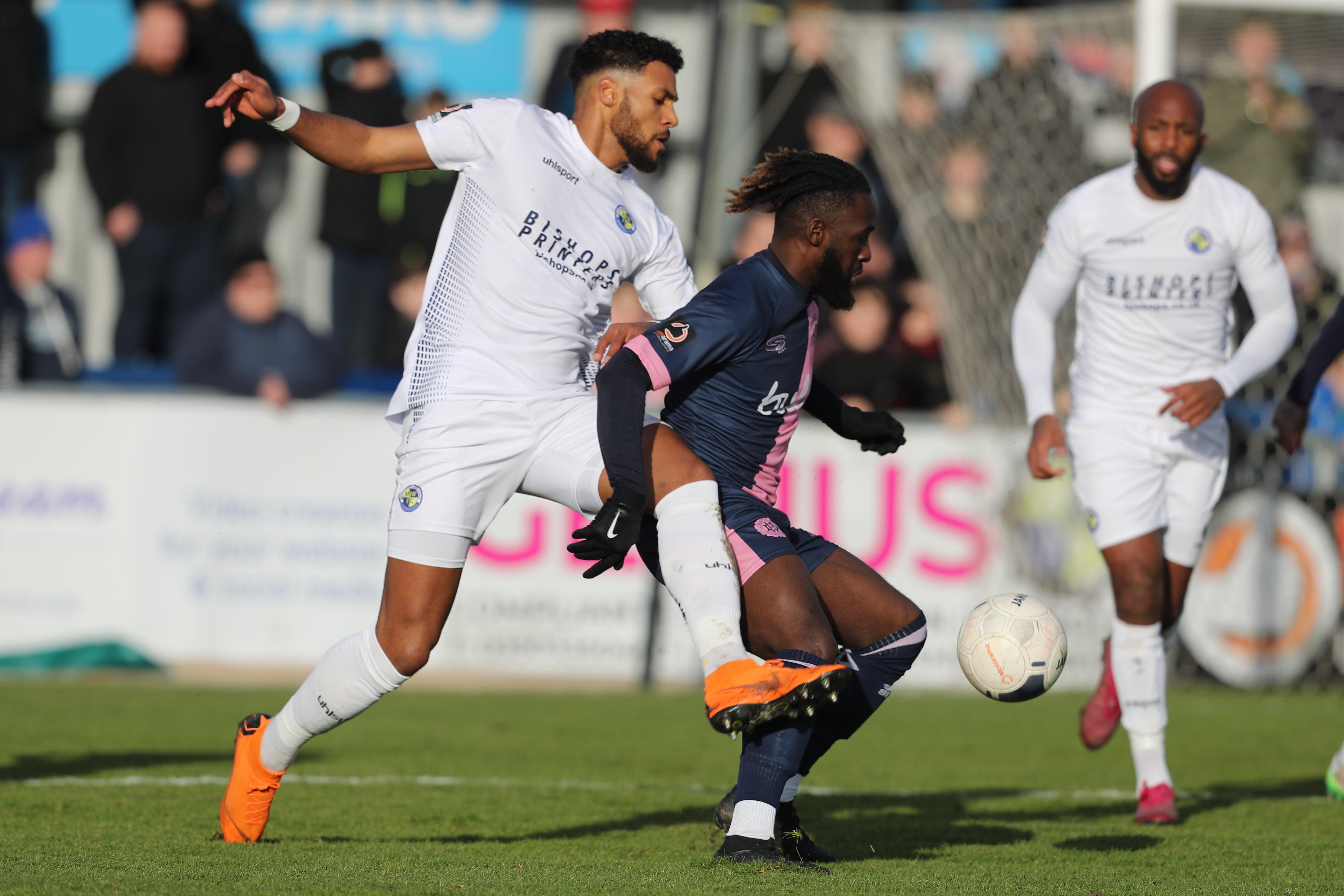 Hawks' Jonah Ayunga tries to win possession from Jeffrey Monakana of Dulwich. Photo by Dave Haines