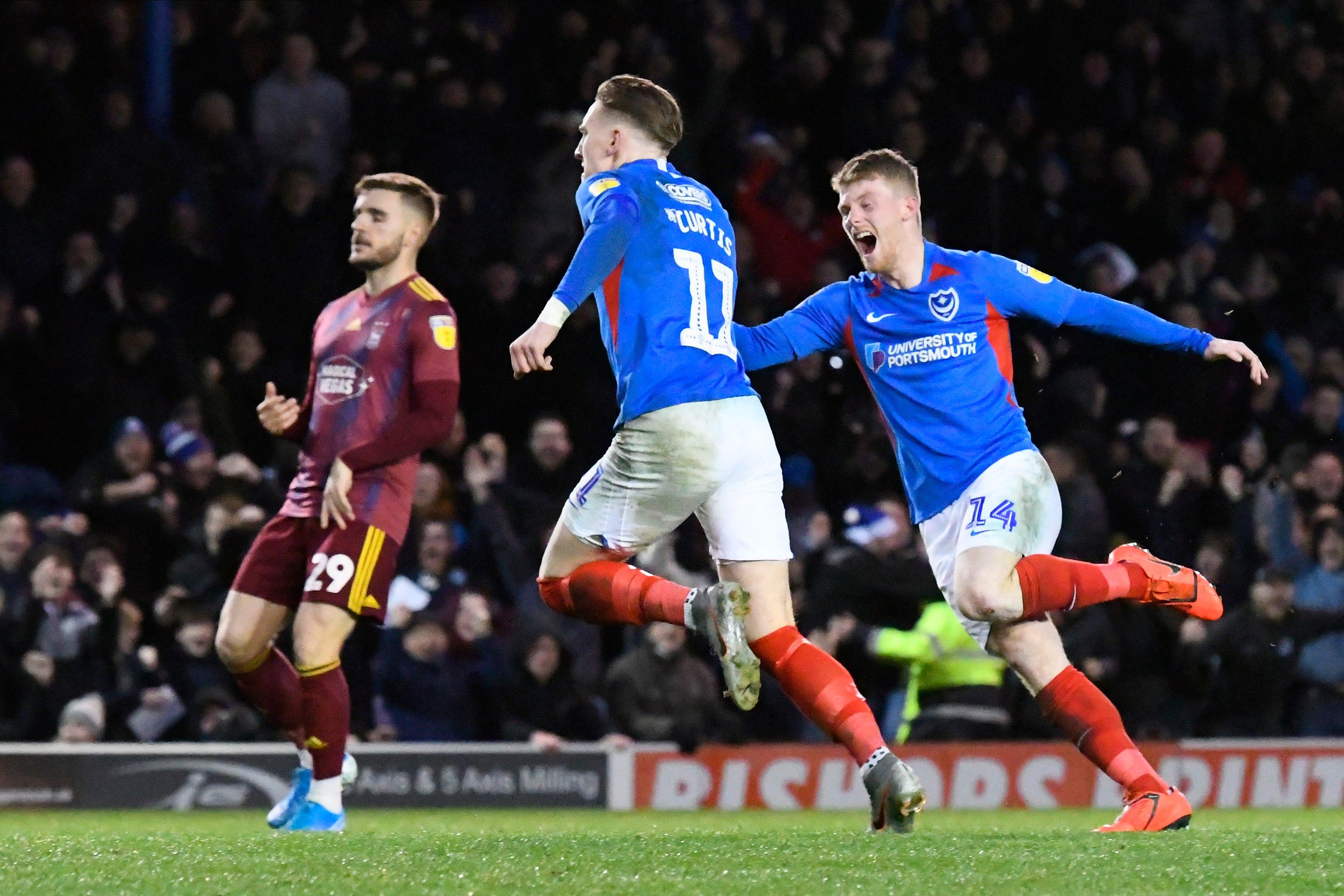 Goal - Ronan Curtis (11) of Portsmouth celebrates after he scores a goal to give a 1-0 lead during the EFL Sky Bet League 1 match between Portsmouth and Ipswich Town at Fratton Park, Portsmouth, England on 21 December 2019.