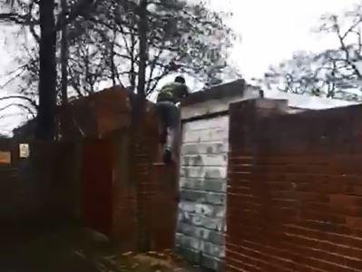 Drug dealer Michael Enzanga, 20, scales a wall after stabbing PC Russell Turner at Stamshaw Park on February 21. Picture: Hampshire police