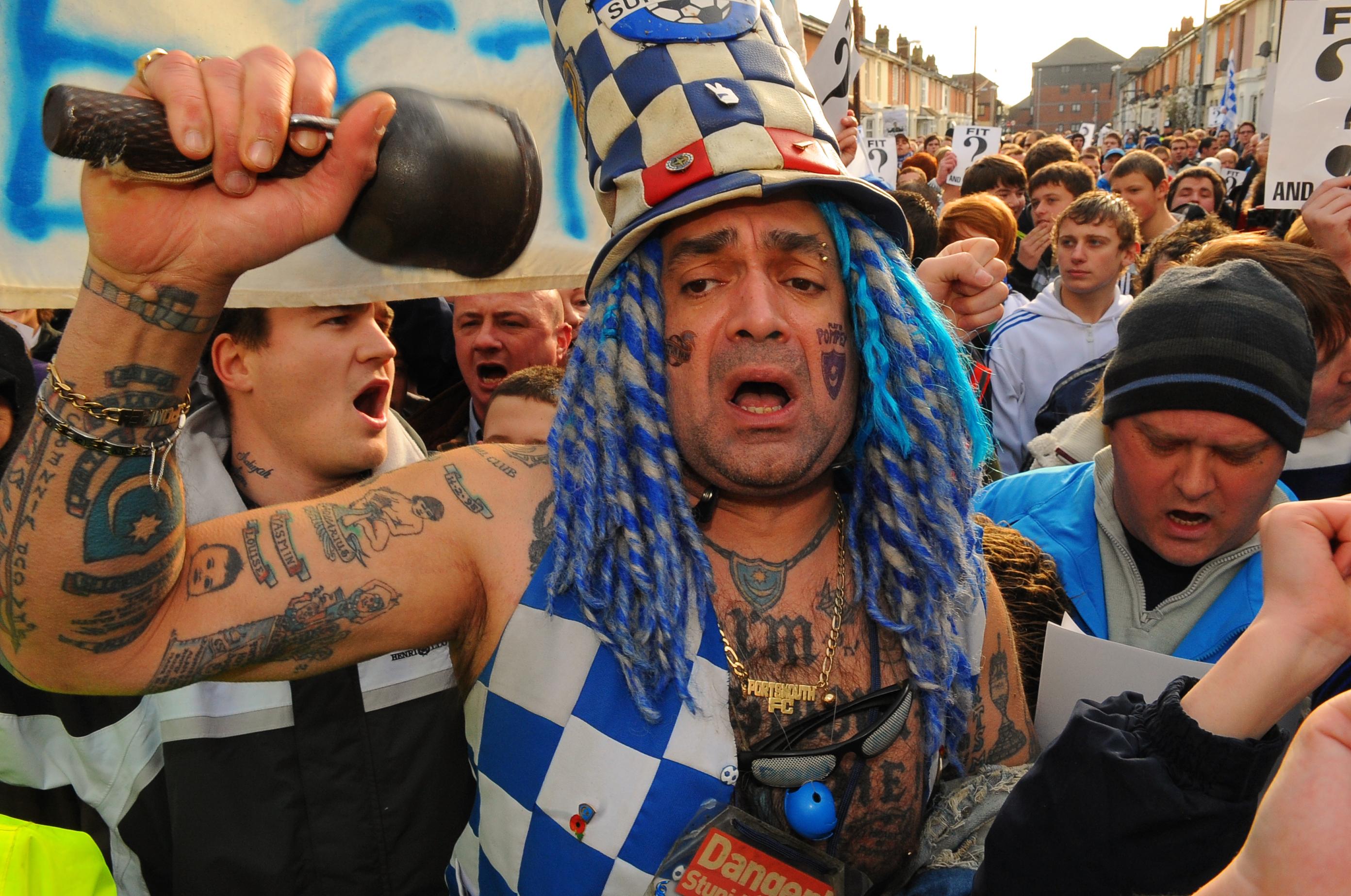 Bookseller John Westwood supporting Portsmouth Football Club