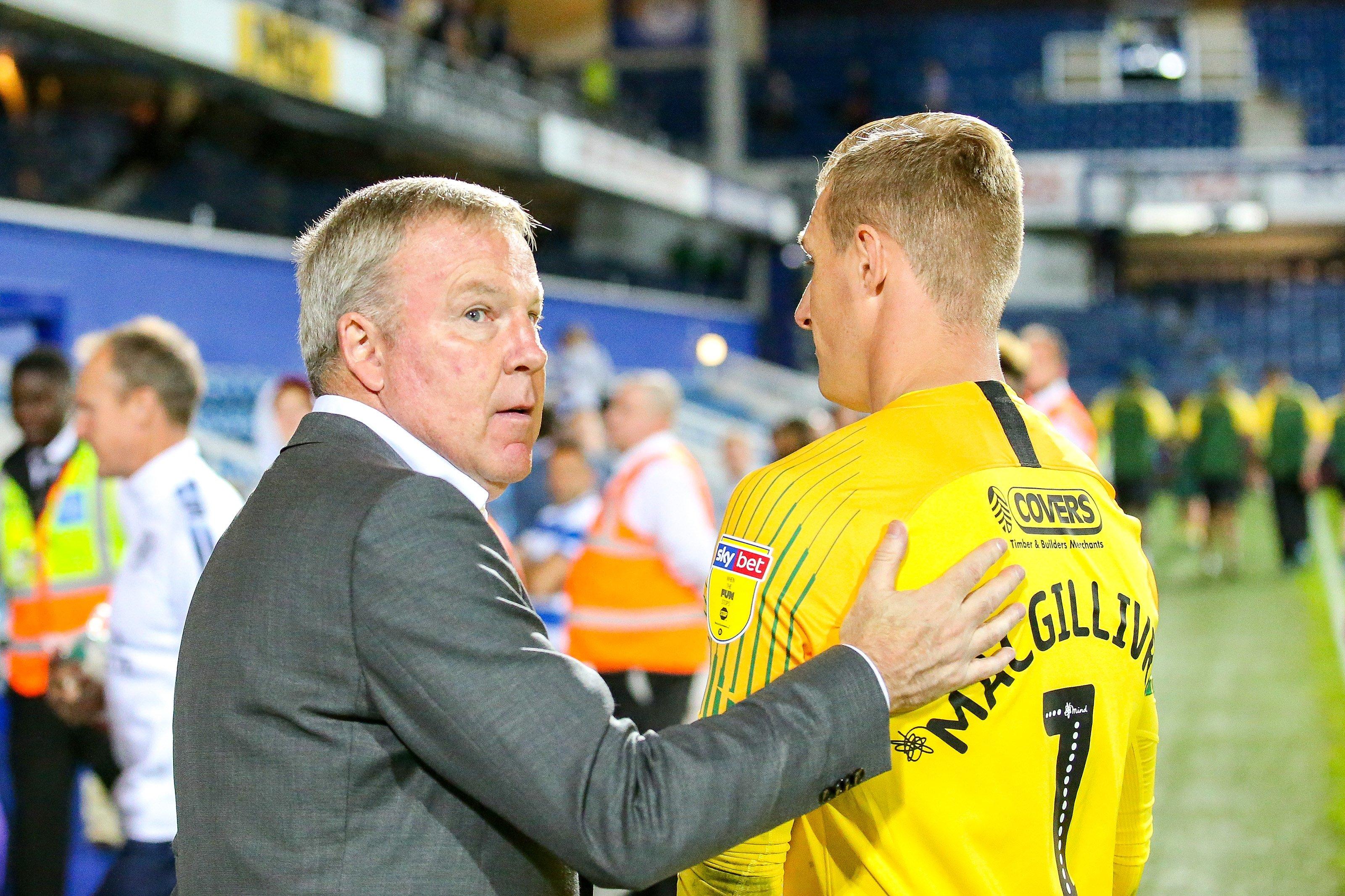 Pompey boss Kenny Jackett, left, with goalkeeper Craig MacGillivray