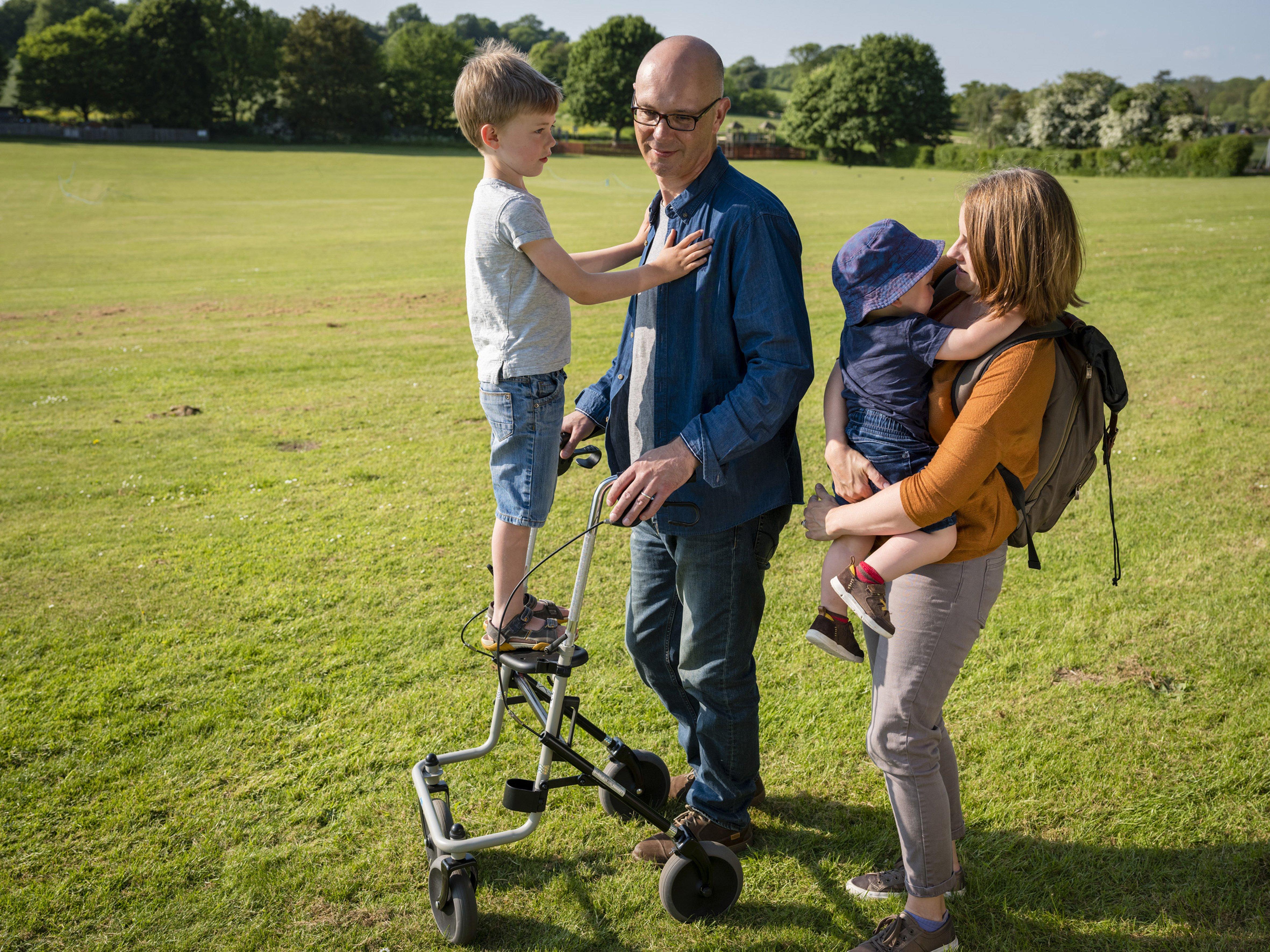 Joe Hammond with his sons Tom, six, and Jimmy, two. Pictured with his children and his wife Gill.
