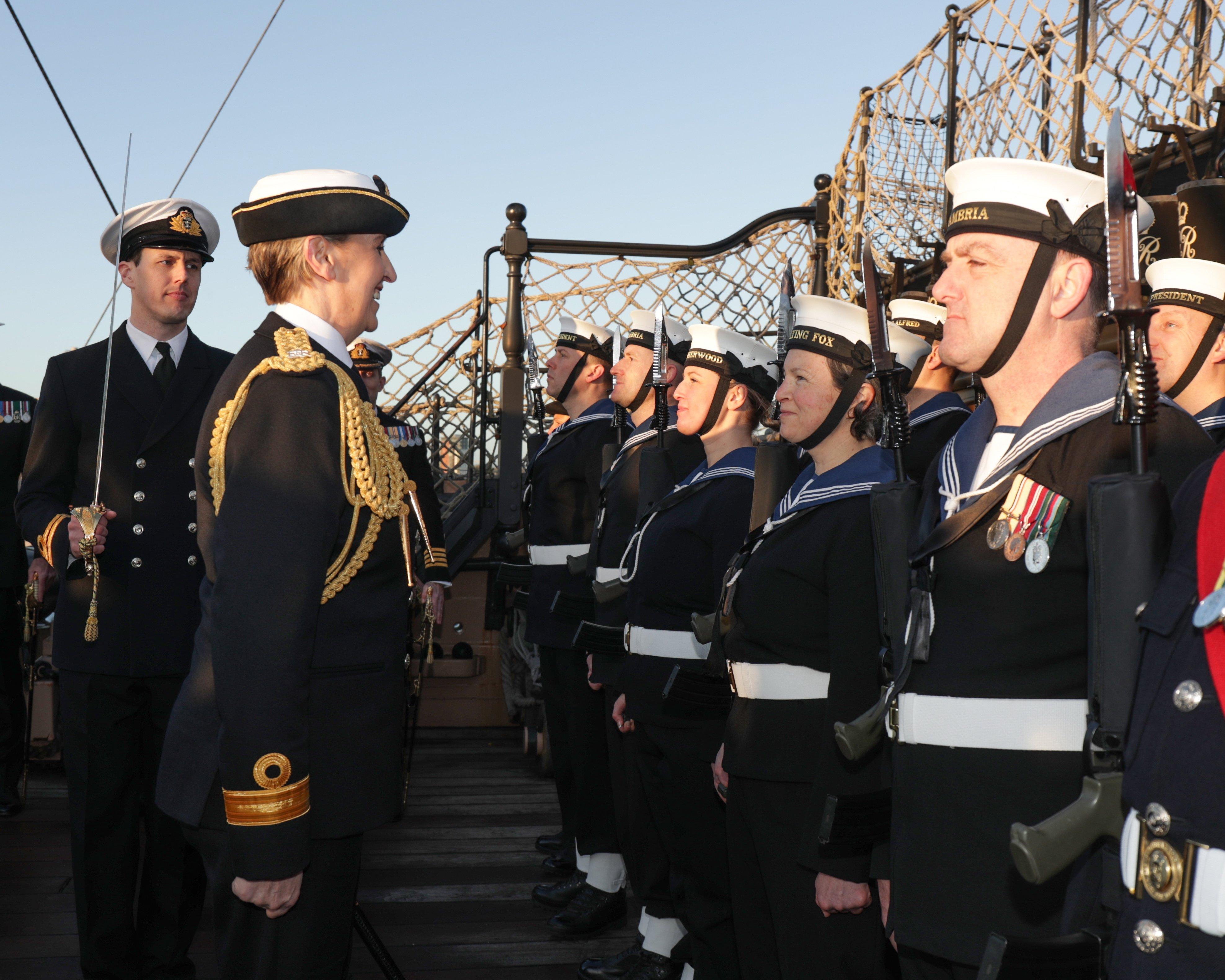 Pictured here is Commodore Robinson inspecting the guard of honour as she takes on her newly appointed role of commander maritime reserves on board HMS Victory in Portsmouth. Photo: Royal Navy