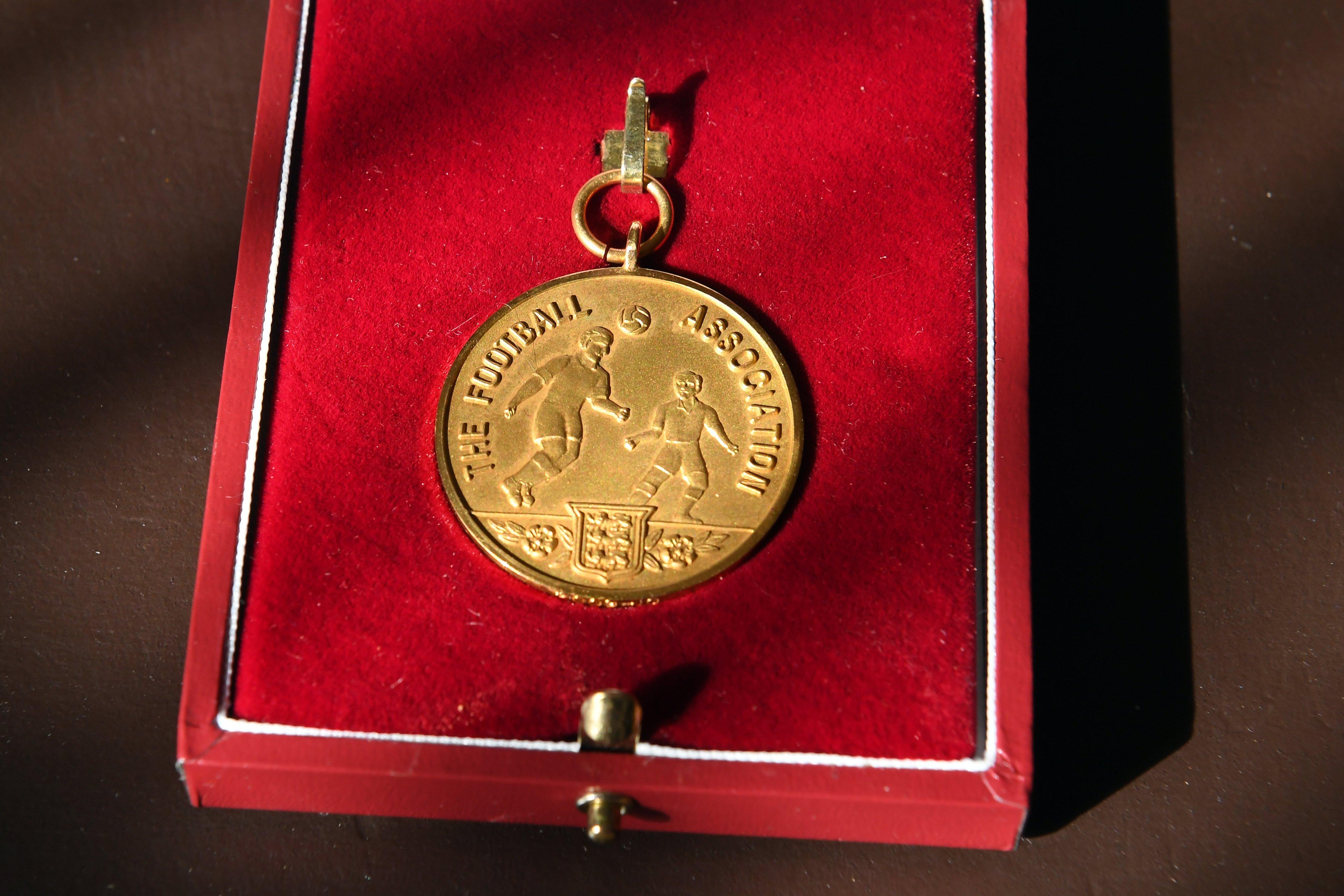 Avram Grant's 2010 FA Cup runners-up medal, handed over to Kev McCormack. Picture: Malcolm Wells (190821-6693)