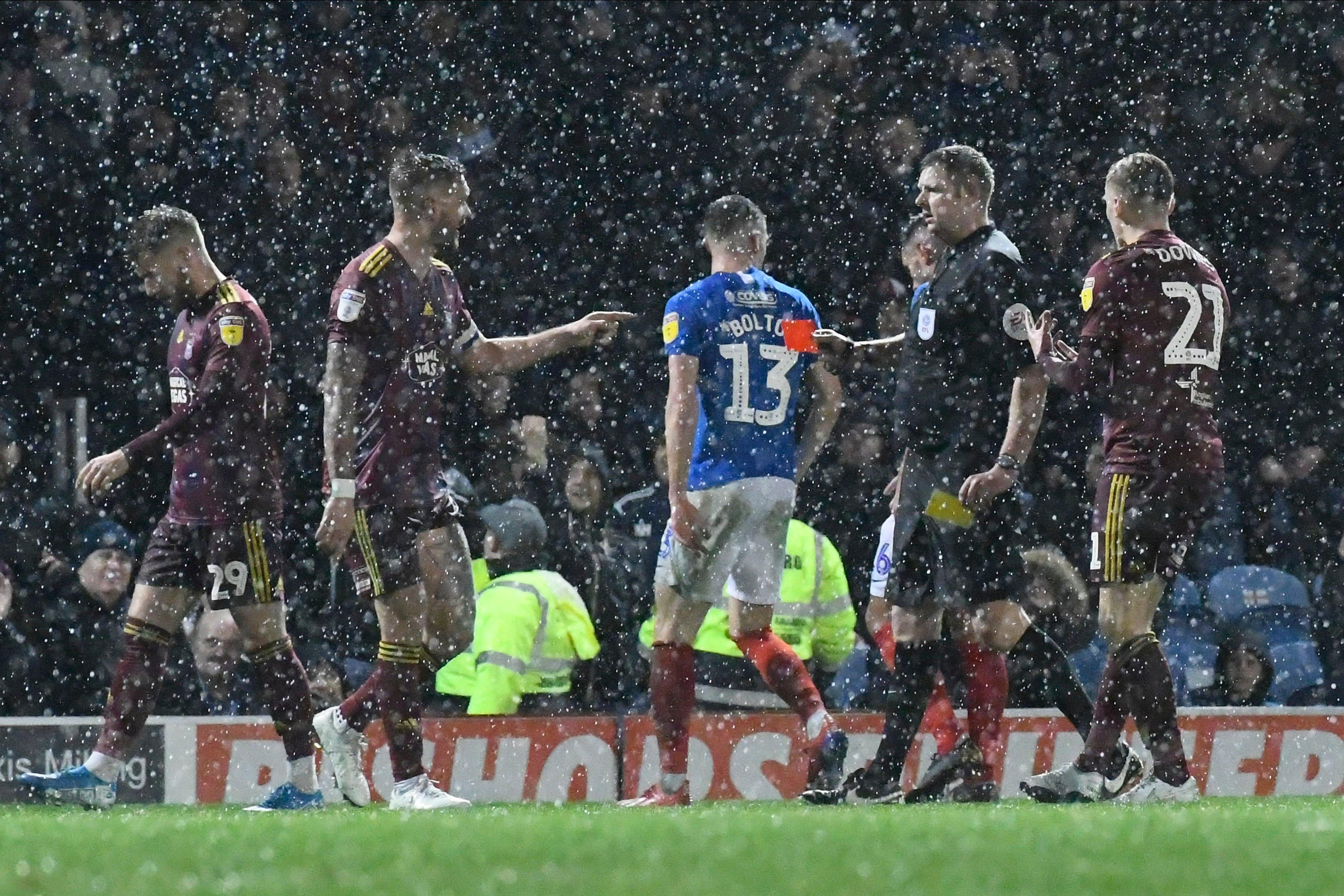 Luke Chambers (4) of Ipswich Town is shown a red card, sent off during the EFL Sky Bet League 1 match between Portsmouth and Ipswich Town at Fratton Park, Portsmouth, England on 21 December 2019.