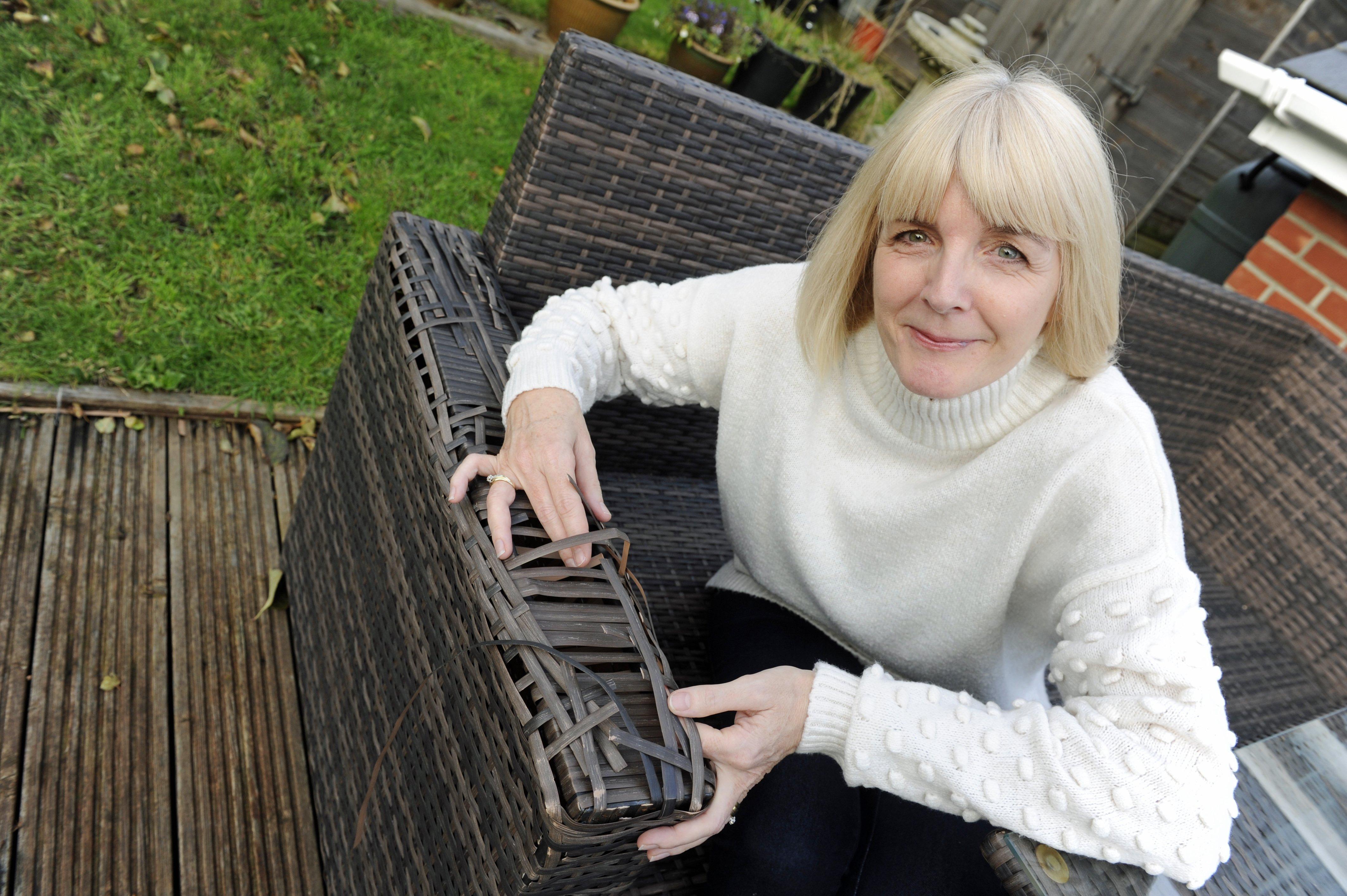Karen Palmer from Drayton with her garden rattan furniture which has disintegrated.
Picture: Ian Hargreaves  (171119-3)