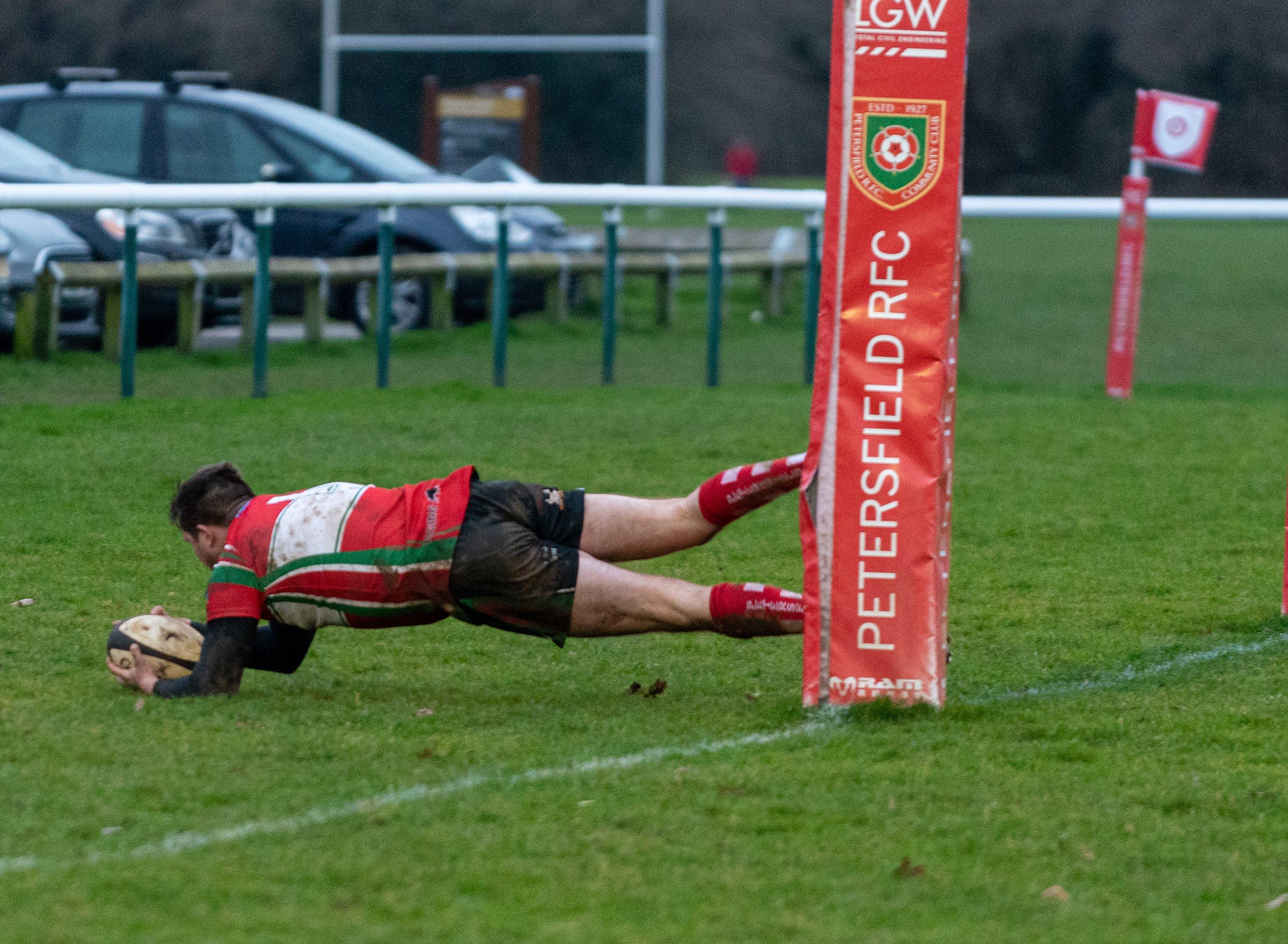 Ryan Moore dives for a try. Picture: Vernon Nash (110120-044)