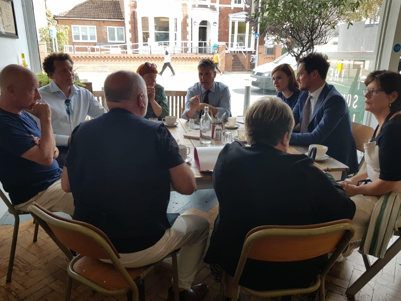 National Labour party leadership candidate Sir Keir Starmer, centre, in Southsea with local business owners and Portsmouth South MP Stephen Morgan, second-right. 