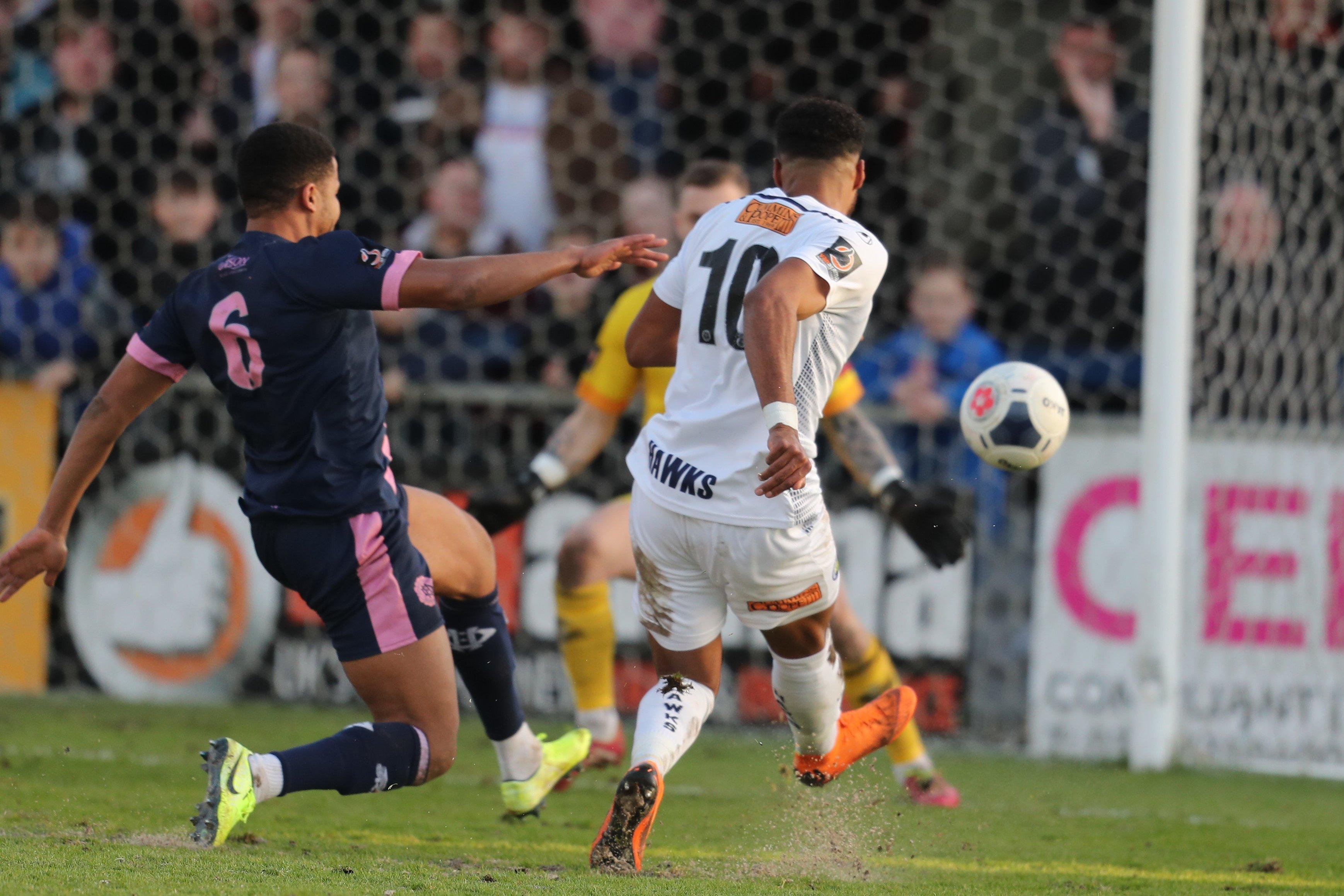 Jonah Ayunga fires wide of the Dulwich goal - the ball bobbling on a cut-up surface just as he was about to shoot. Photo by Dave Haines/Portsmouth News