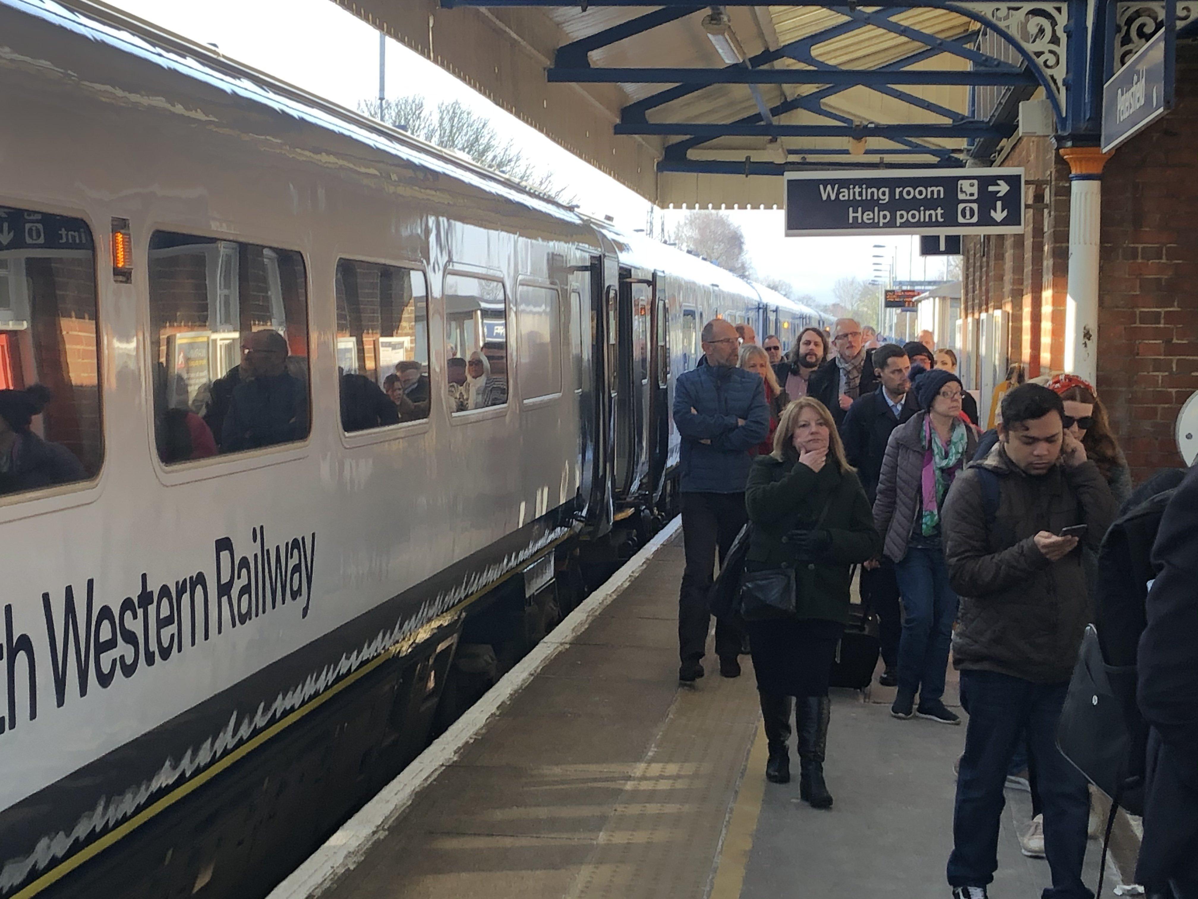 Hundreds of passengers were ordered to evacuate a train in Petersfield after its brakes overheated flooding coaches with smoke. Picture: Tom Cotterill