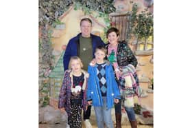 Charlotte Ralph with her husband John and children Ben and Kezia Picture from Cancer Research UK