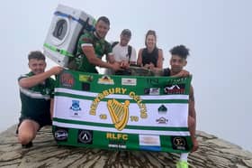 Tommy Dunford and supporters at the summit of Snowdon.