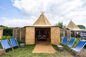 A glamping site is providing posh accommodation for fussier Glastonbury Festival goers. 
