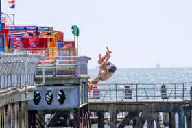 Tombstoning risks "serious injury or even death", warns council as action plan set up to deter youngsters leaping into the Portsmouth seas. Pictured - Kids throwing themselves from South Parade Pier in 2022.