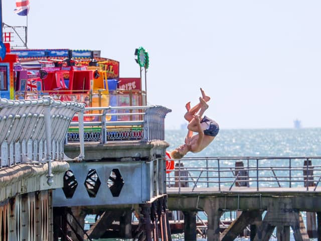 Tombstoning risks "serious injury or even death", warns council as action plan set up to deter youngsters leaping into the Portsmouth seas. Pictured - Kids throwing themselves from South Parade Pier in 2022.