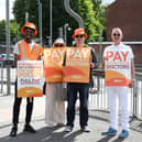 Junior doctors strike at the picket line outside Queen Alexandra Hospital: (left to right)Dr Raymond Effah, Penny Foskett, supporter, Jon Woods and Frank Minal, BMA industrial relations officer.

