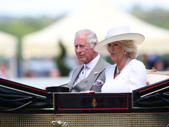 The Prince of Wales with The Duchess of Cornwall are seen in the royal procession during Day Two of Royal Ascot 2022