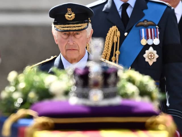 King Charles III walks behind the coffin of Queen Elizabeth II. Photo: Getty