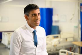 Prime Minister Rishi Sunak speaks with members of the media as he visits Croydon University hospital on October 28.