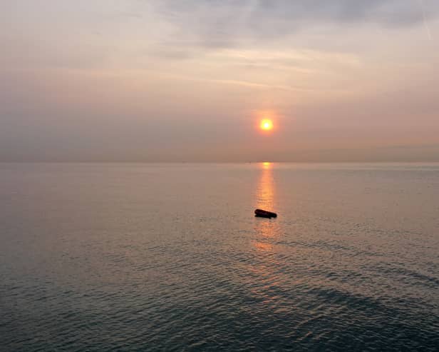 An empty dinghy used by migrants to get to Dover. A interim report has found that migrants trying to get to the UK who died after their dinghy capsized had reached UK waters.