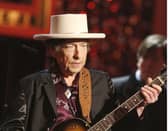 Bob Dylan has issued a rare public apology for selling books with automated signatures.  