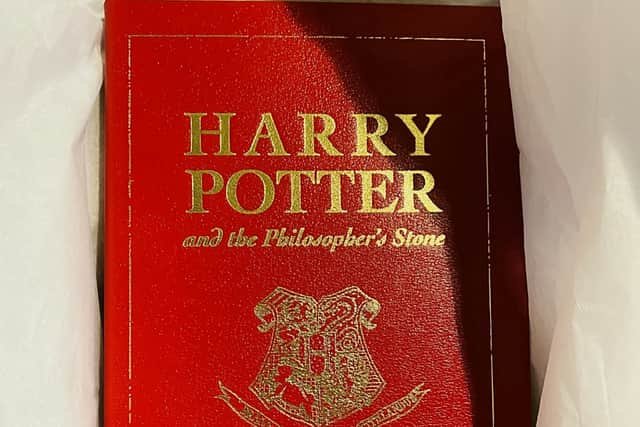 The leather-bound special 15th  anniversary edition of Harry Potter and the Philosophers Stone -  published exclusively for the competition in 2012.