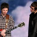 Liam And Noel Gallagher have been told to bury the hatchet as mum Peggy turns 80.