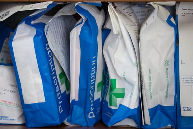 Pharmaceuticals and prescriptions awaiting collection are seen inside a independent chemist shop are seen on February 12, 2016 in Bath.