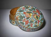 An exceptionally rare Chinese box and cover from the 15th century Ming period has been discovered in a dust-filled cabinet in the attic of a family home, where it had been stored and left untouched since the owner’s death in 1967.