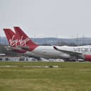 Virgin Atlantic planes sit on the runway at Glasgow Airport.