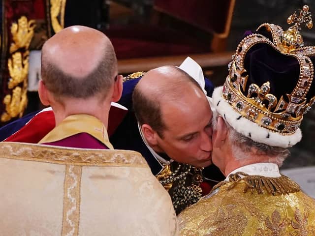  Prince William kisses his father, Britain’s King Charles III as he pays homage (Photo: Getty Images)