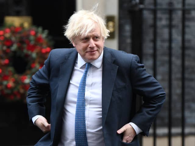 Boris Johnson has previously promised that Christmas 2021 would be ‘considerably better’ than last year's (image: AFP/Getty Images)