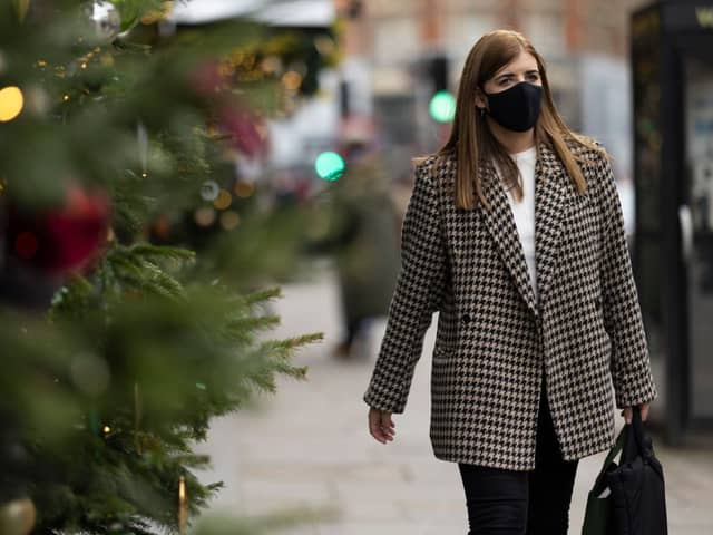 The UKHSA has projected that should Omicron continue spreading at its current rate, there could be between 80,000 to 90,000 UK cases per day by the end of December (image: Getty Images)