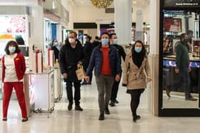 Face masks will be compulsory in shops and on public transport in England from Tuesday (29 November) (Photo: Getty Images)