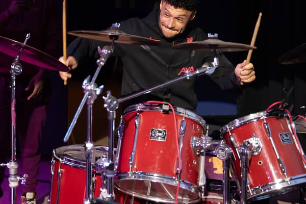 Alex Oxlade-Chamberlain accompanying Liverpool Lighthouse combined choirs, Love & Joy Gospel Choir & Lighthouse Choir, on drums. Image: Brian Roberts