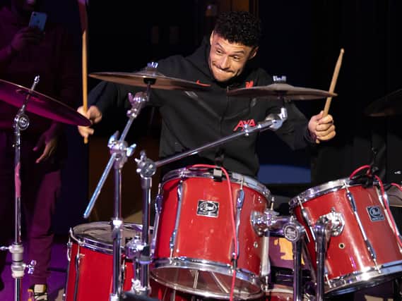 Alex Oxlade-Chamberlain accompanying Liverpool Lighthouse combined choirs, Love & Joy Gospel Choir & Lighthouse Choir, on drums. Image: Brian Roberts