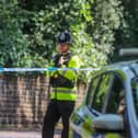 Police on Magdala Road, Nottingham where a man was found dead.