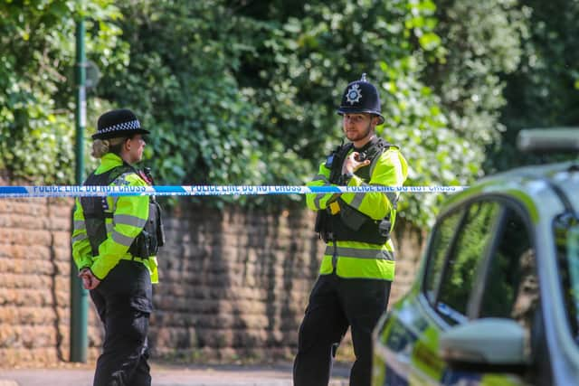 Police on Magdala Road, Nottingham where a man was found dead.