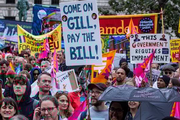 Striking teachers from the National Education Union (NEU) hold a rally in Parliament Square on 5 July 2023 in London, United Kingdom. NEU members are striking to win a fully-funded, above-inflation pay rise for all educators. (photo by Mark Kerrison/In Pictures via Getty Images)