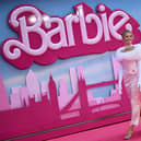 Australian actress Margot Robbie poses on the pink carpet upon arrival for the European premiere of “Barbie” in central London.