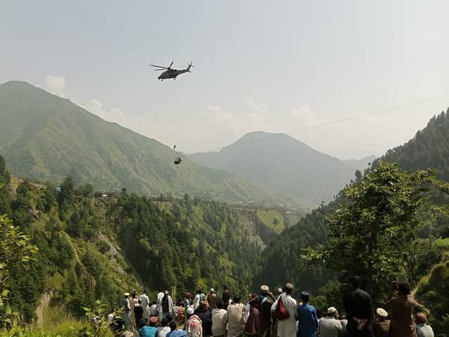 Eight people have been rescued after being trapped inside a cable car in Pakistan