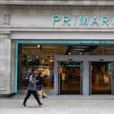 A pedestrian walks past a Primark store on Oxford Street, London.